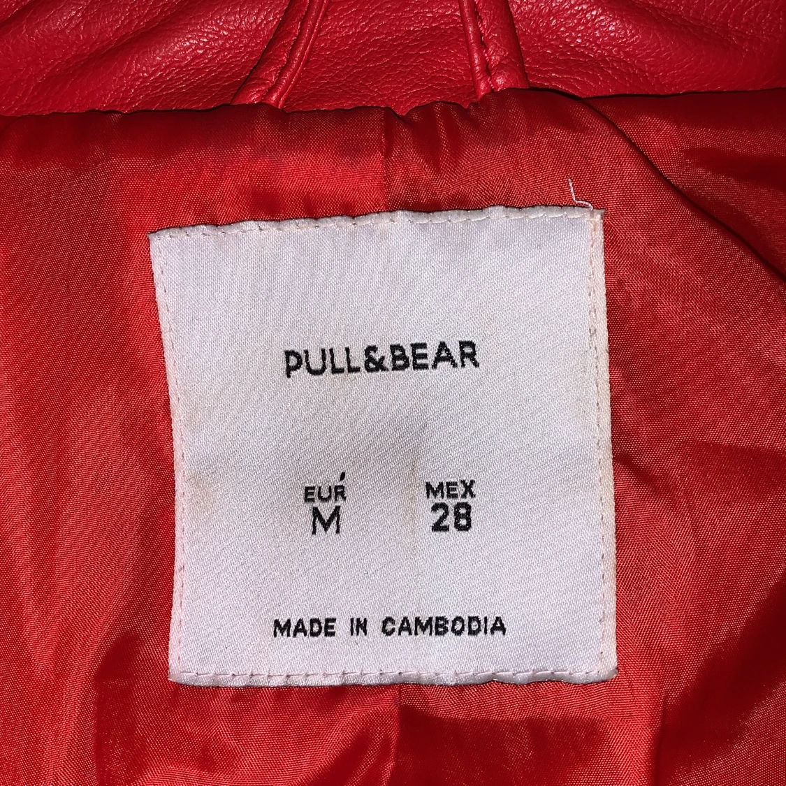 Röd skinnjacka  - 90