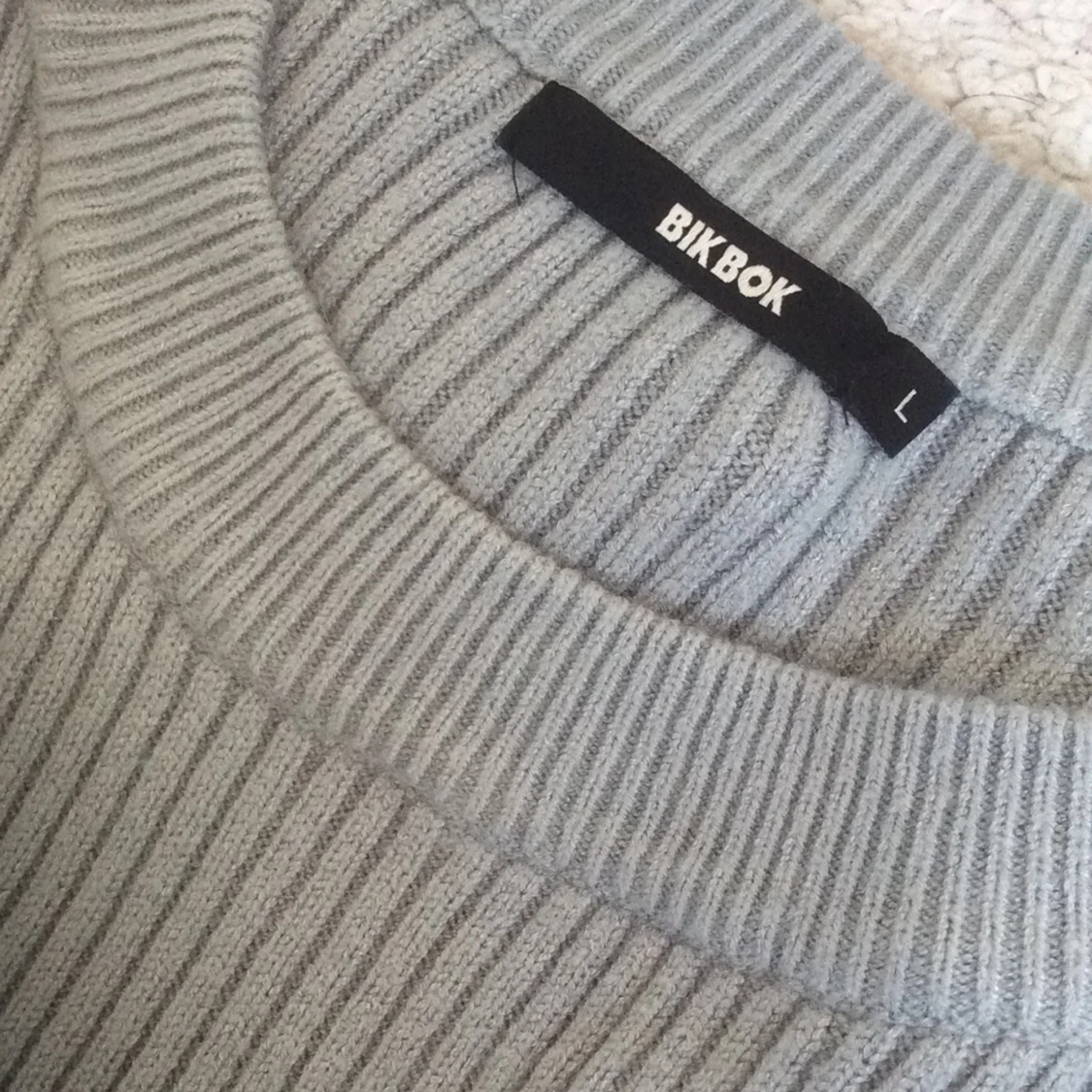 Ribbstickad tröja - 91