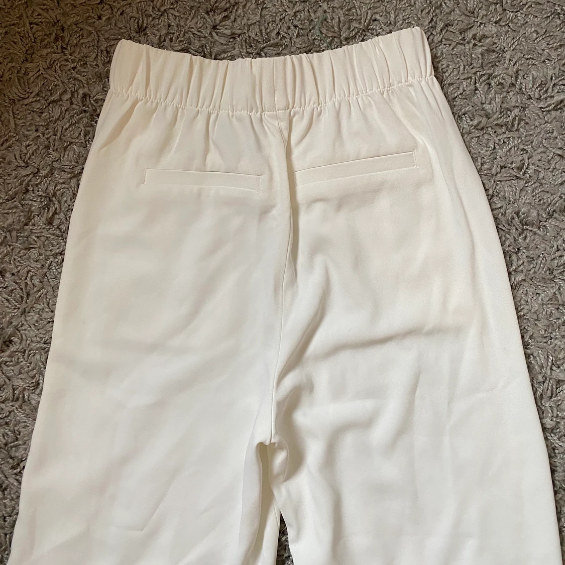 Vita kostymbyxor - 90