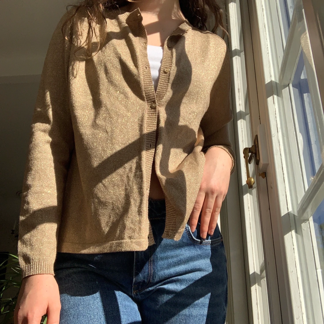 Glittrig kofta i guld  - 91