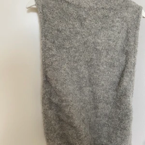 Väst stickad - Stickad väst. Ull