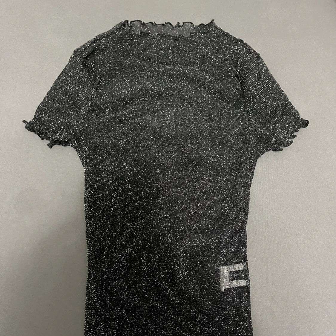 Glittrig topp
