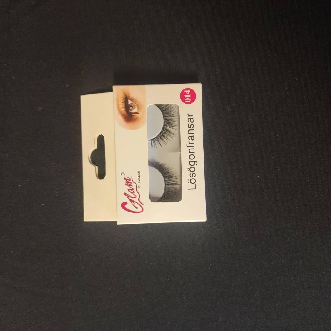 Oanvända lösögonfransar