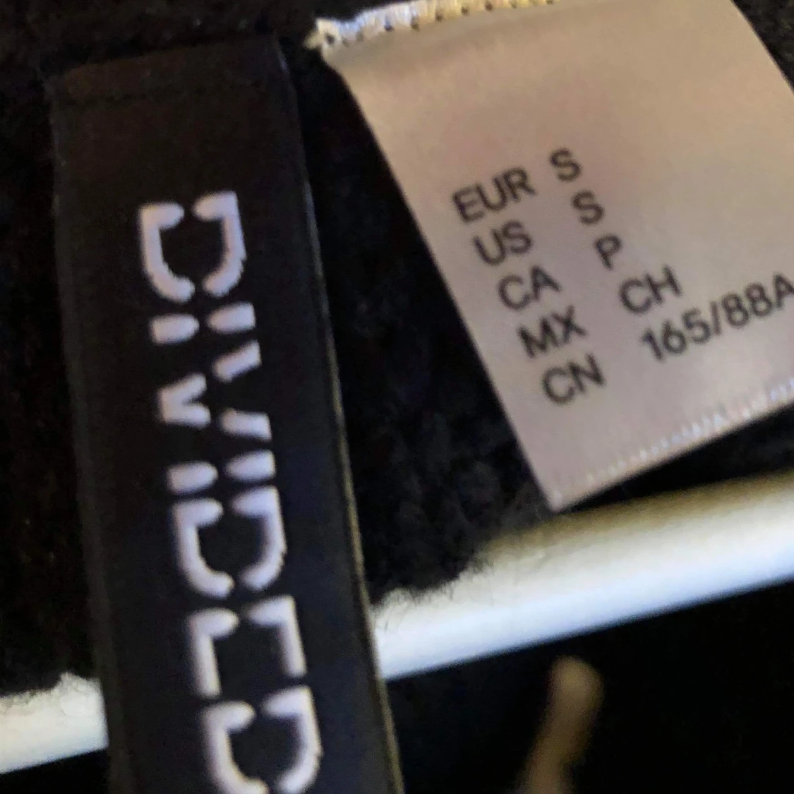 Svart stickad väst - 91