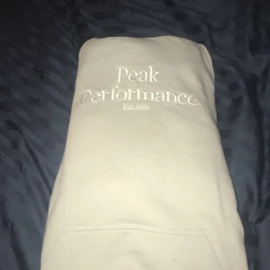 Peek performance hoddie - En beige/vit hoddie i S passar också xs aldrig använt 