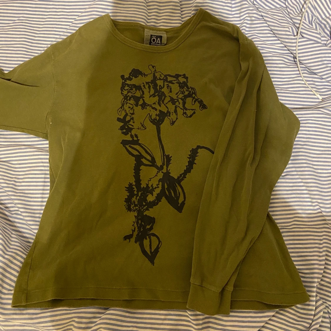 Grön tröja med tryck