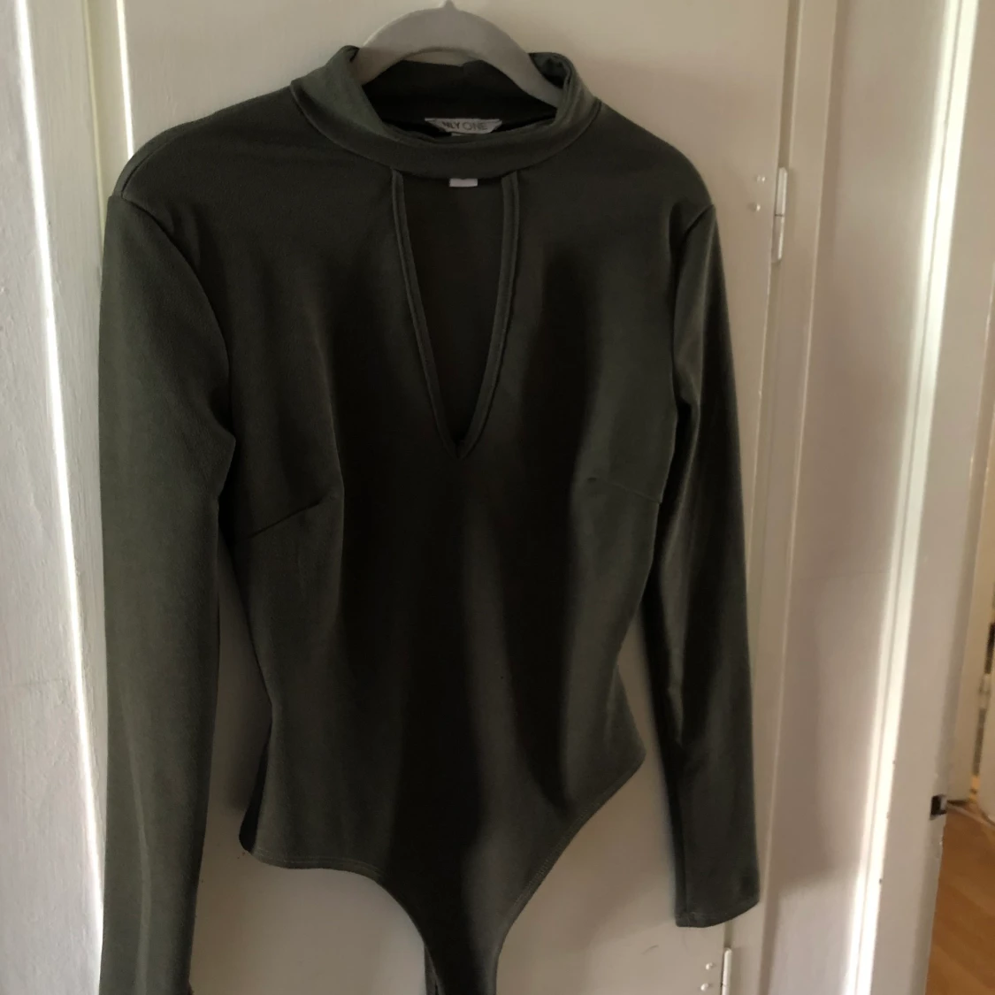 Grön body från Nelly storlek M - 90