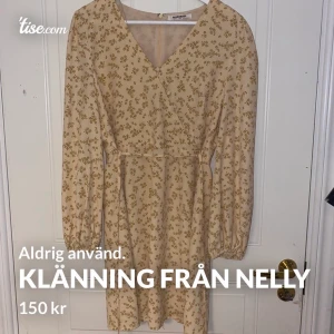 Klänning från Nelly  - Aldrig använd 