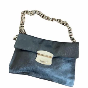 PRADA Black leather shoulder bag.  - Preloved PRADA Black leather shoulder bag with chain strap. 