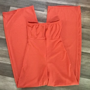 Jumpsuit - Neon Orange passar xs och någon som är ca 160 lång 