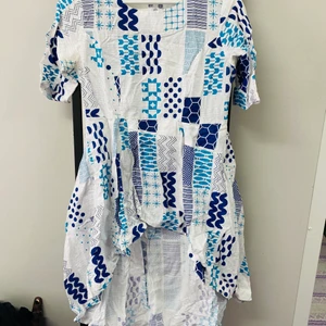 Summer dress - Nice white and blue color dress, perfect for summer. Comfortable material. Used dress, going to sell because it does not fit me