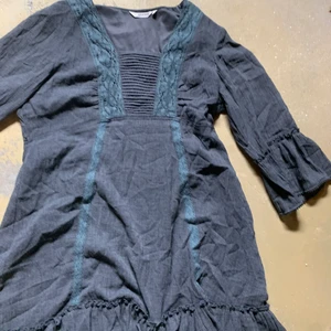 Klänning  - Storlek 42