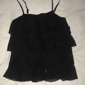 Topp -  Populär topp från Lindex .