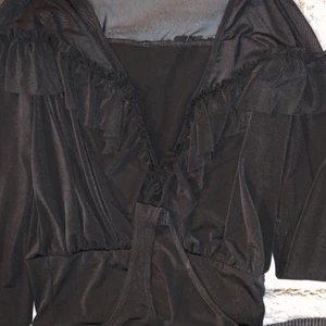 Svart blus body - Svart blus string body, jätte skönt materialt, använd en gång