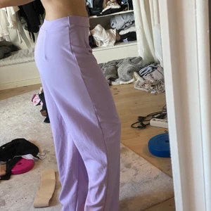 Lila byxor 36 - Aldrig använda.