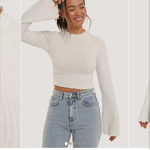 Ribbad trumpet ärmad tröja - Vit helt oanvänd tröja från NAKD, storleken är  XXS men passar mig som är XS, köpt för 269kr