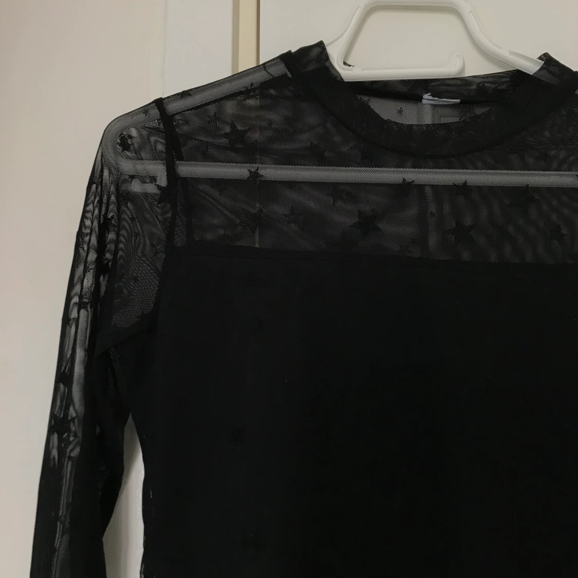 Svart långärmad med stjärnor - 91