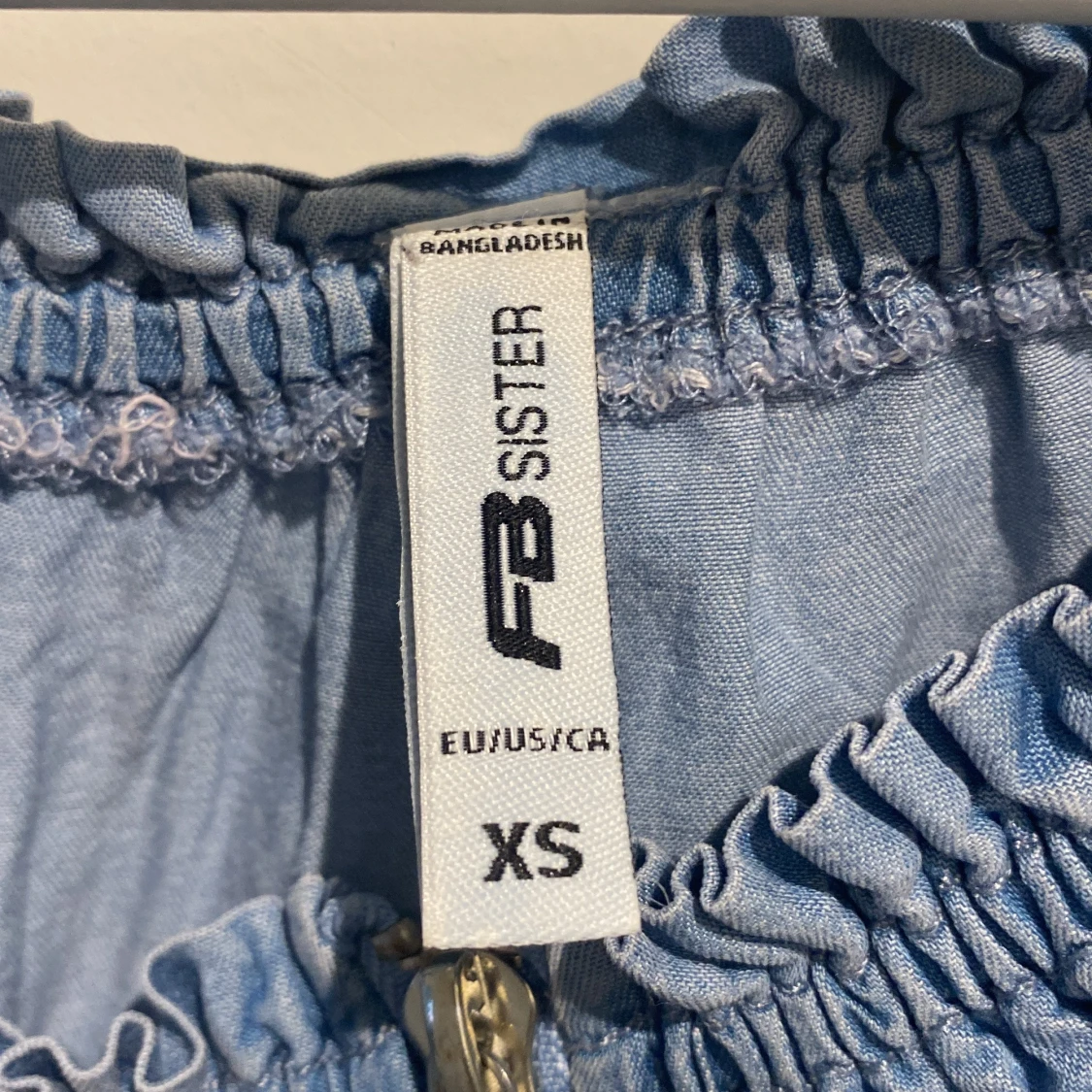 Blå topp med dragkedja - 91