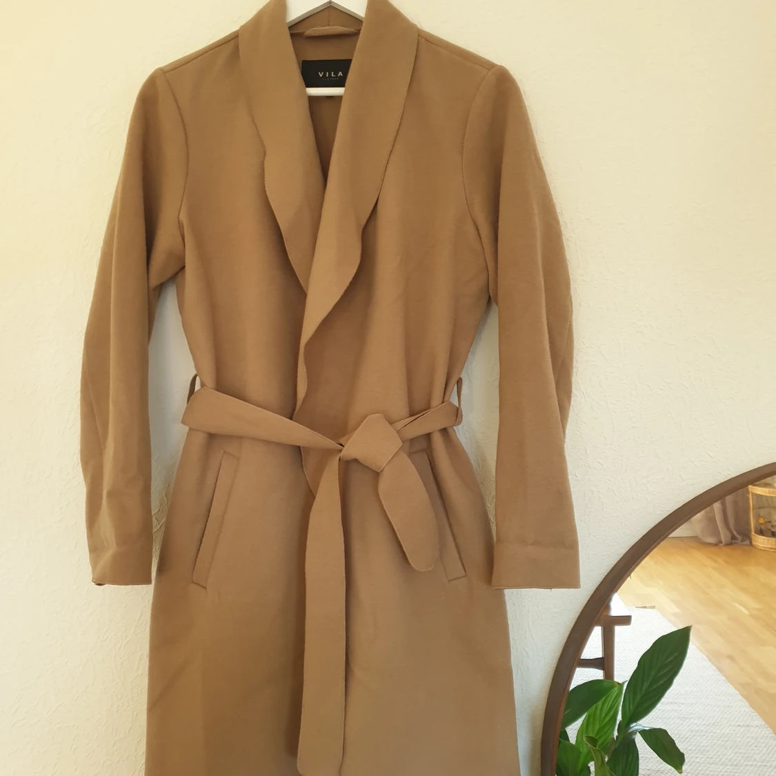 Ljusbrun kappa från Vila, stl M