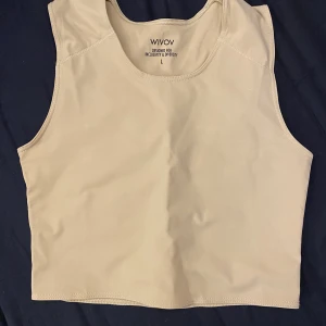 Binder - Helt ny binder, storlek L, säljer då den inte passade