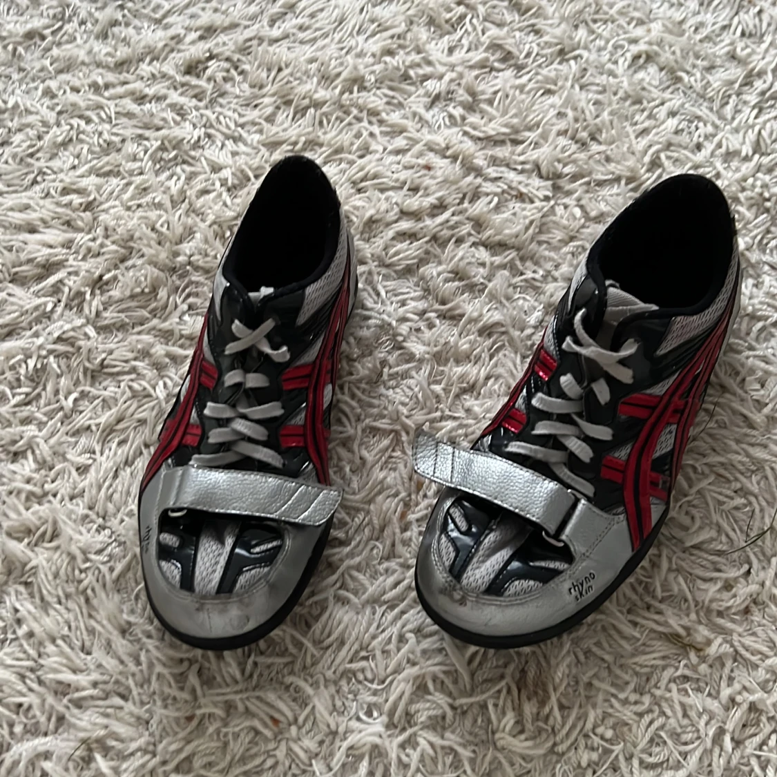 Asics rhyno skin skor