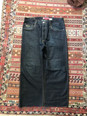 baggy jeans - längd:103cm midja49cm benöppning:28cm