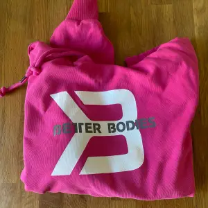 Croppad hoodie från better bodies i rosa. Aldrig använd