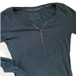 Tröja - Tröja med knappar