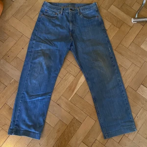 Blå Levis Jeans - Snygga baggy urtvättade levis jeans. Strl 34/34