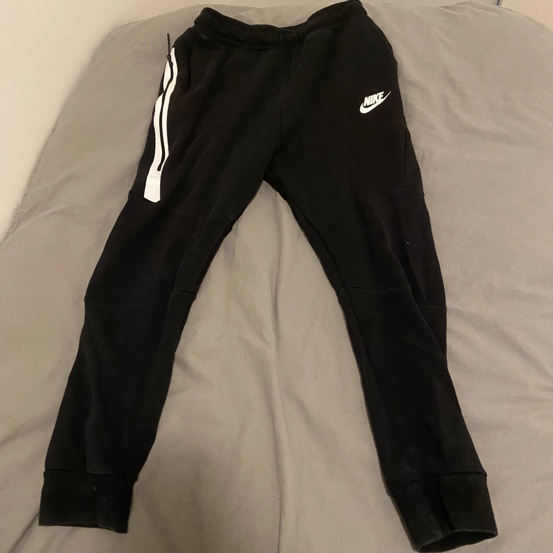 Nike teck byxor svart