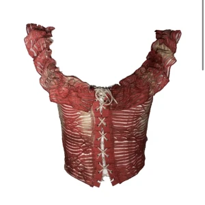 Off shoulder volang topp - Finns att köpa på jealoussecondhand.com