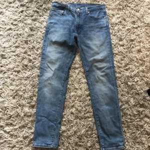 Levis 512 - Bra skick. 