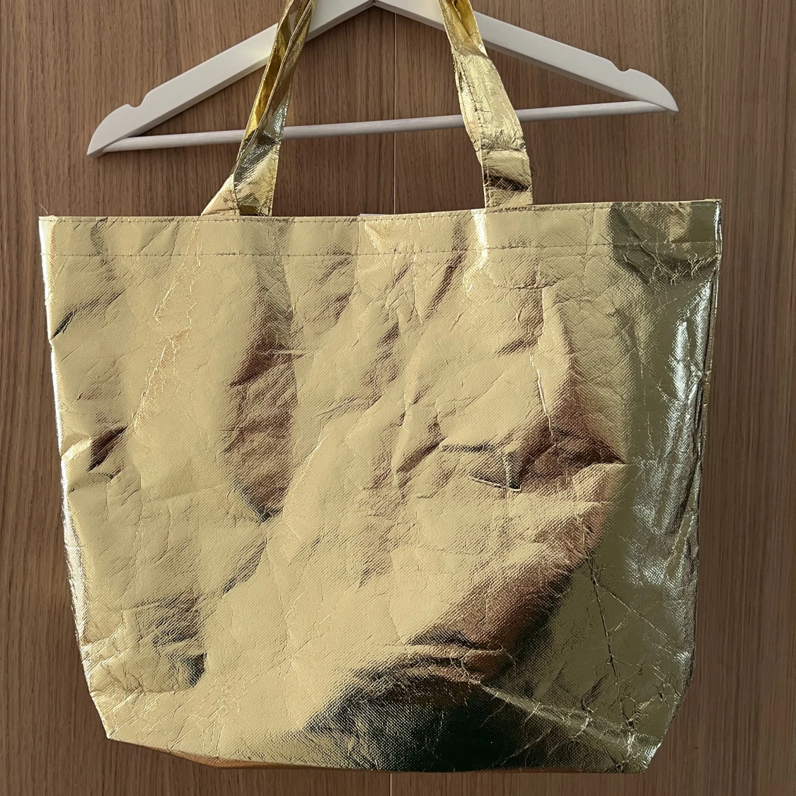 Underbar tygväska i guld!