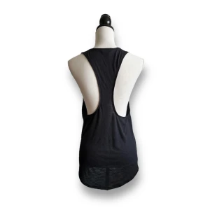 Längre linne - Lite genomskinligt material, se bild! Superskönt!