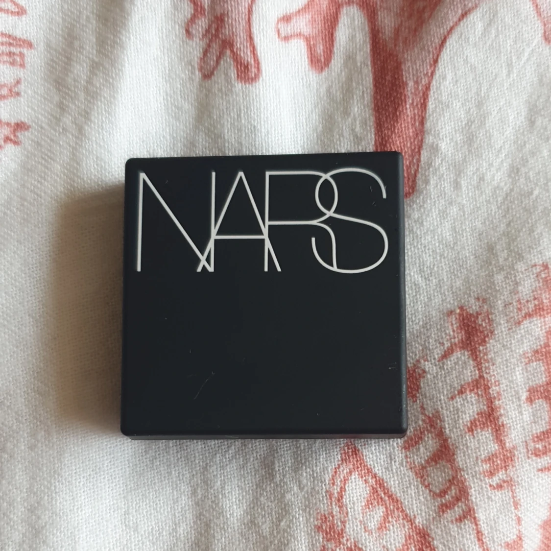 Nars blush i färgen orgasm 