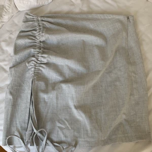 Minikjol - Minikjol från boohoo med justerbar sida