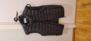 Tunnare väst - En tunnare väst. 