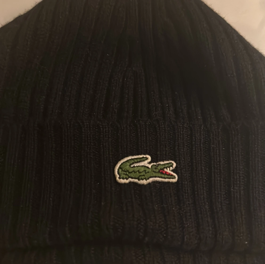 Mössa från Lacoste  - 90
