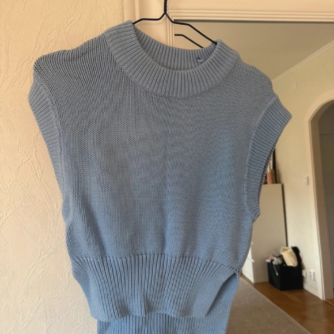 Blå stickad kortärmad