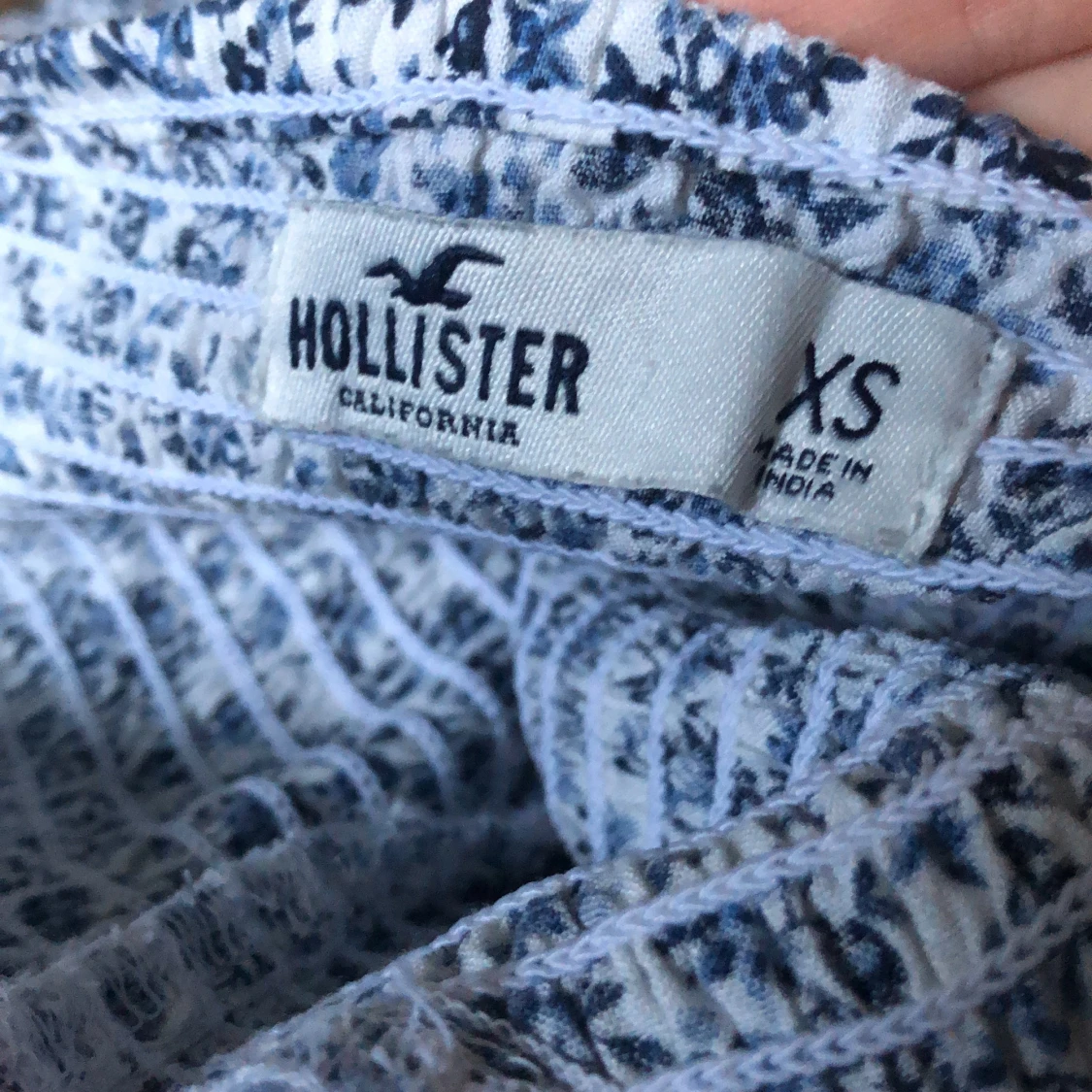 Långarmad blommig playsuit från hollister storlek XS - 91
