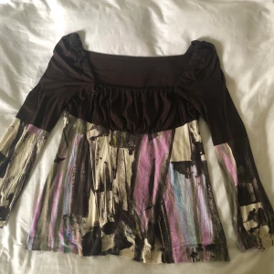 Babydoll topp M/L - Babydoll topp, i gott skick men utan lapp. Ca strl M/L.