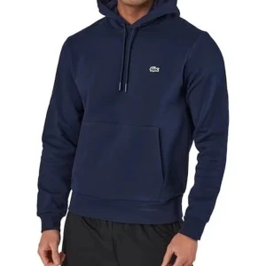 Lacoste Hoodie - Mörkblå lacoste hoodie i skick 9/10