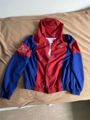 Lacoste vind jacka  - Nyskick använd fåtal gånger 