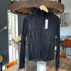 Blus - Aldrig använd 