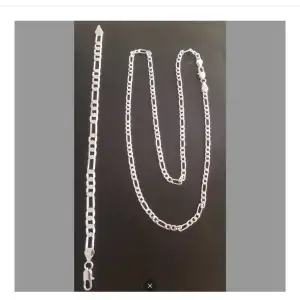 Silverpläterad halsband och armband  Ny Halsband är 55 cm längd 4mm bred. Ny Armband är 20 cm längd 6cm bred.