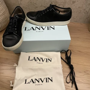 Lanvin  - Lanvin svarta storlek 10   Box och dustbags ingår. Nya skosnören ingår.  Billigare vid snabb affär!