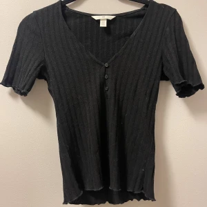 Ribbad t-shirt - Svart ribbad t-shirg