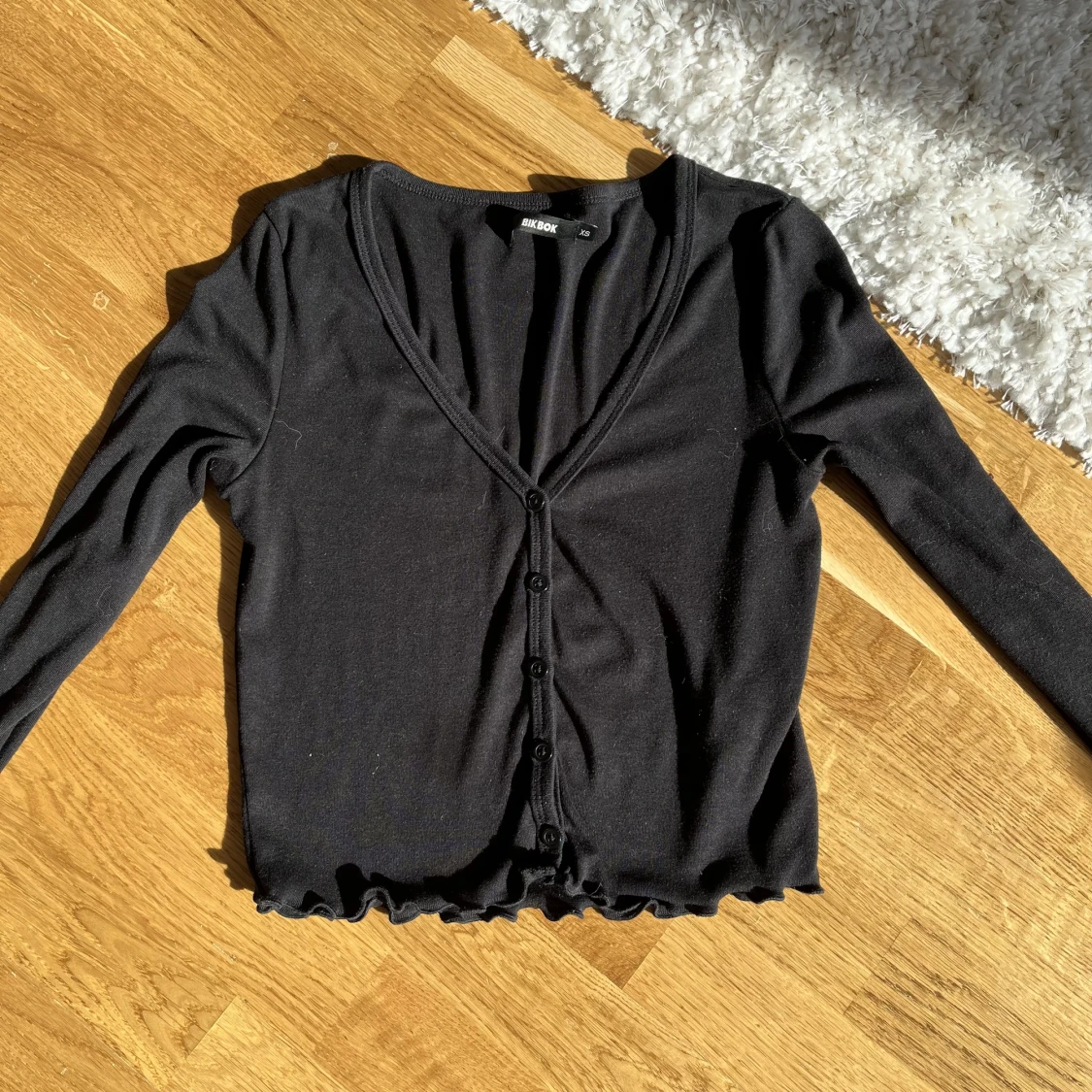 Tröja med knappar fram