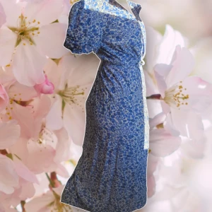 Sommarklänning  - En fin omlott klänning perfekt för en varm sommardag.  Storlek M