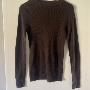 Stickad tröja - Ny skick